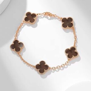 Van Cleef & Arpels Rose Gold Four-Leaf Clover Bracelet with Brown Accents